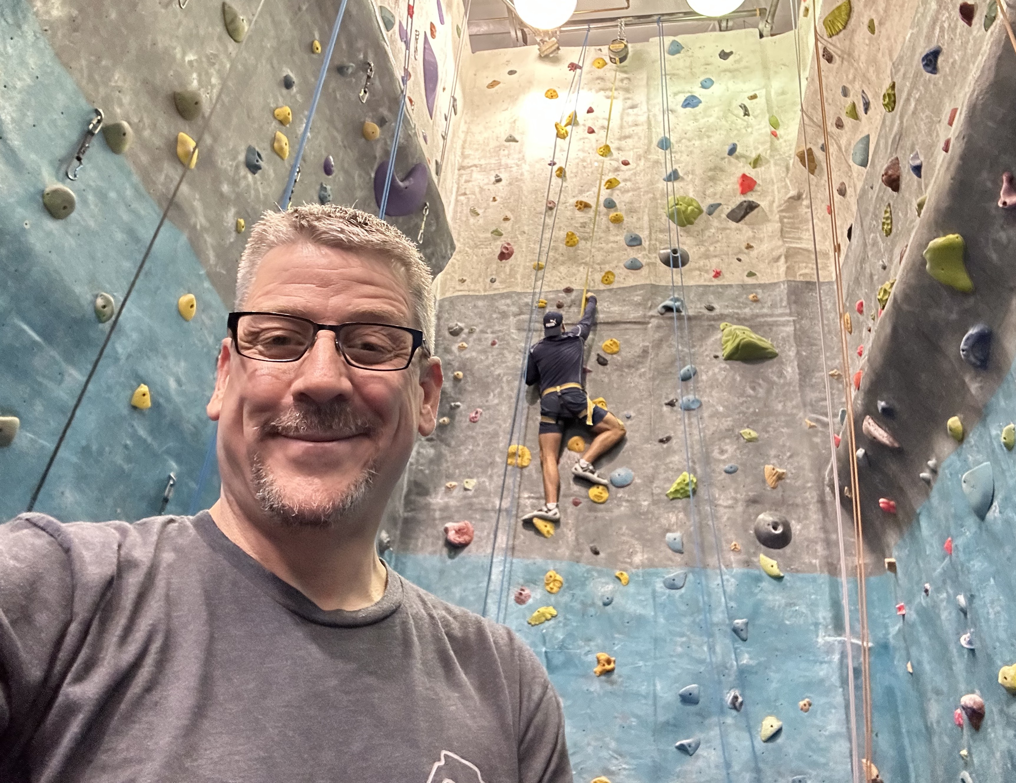 Bill at a climbing wall