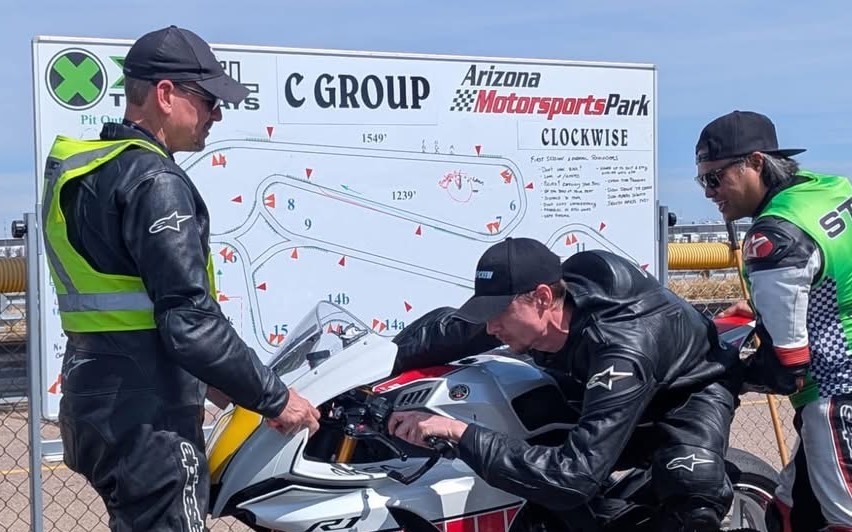 Bill coaching a rider at the track