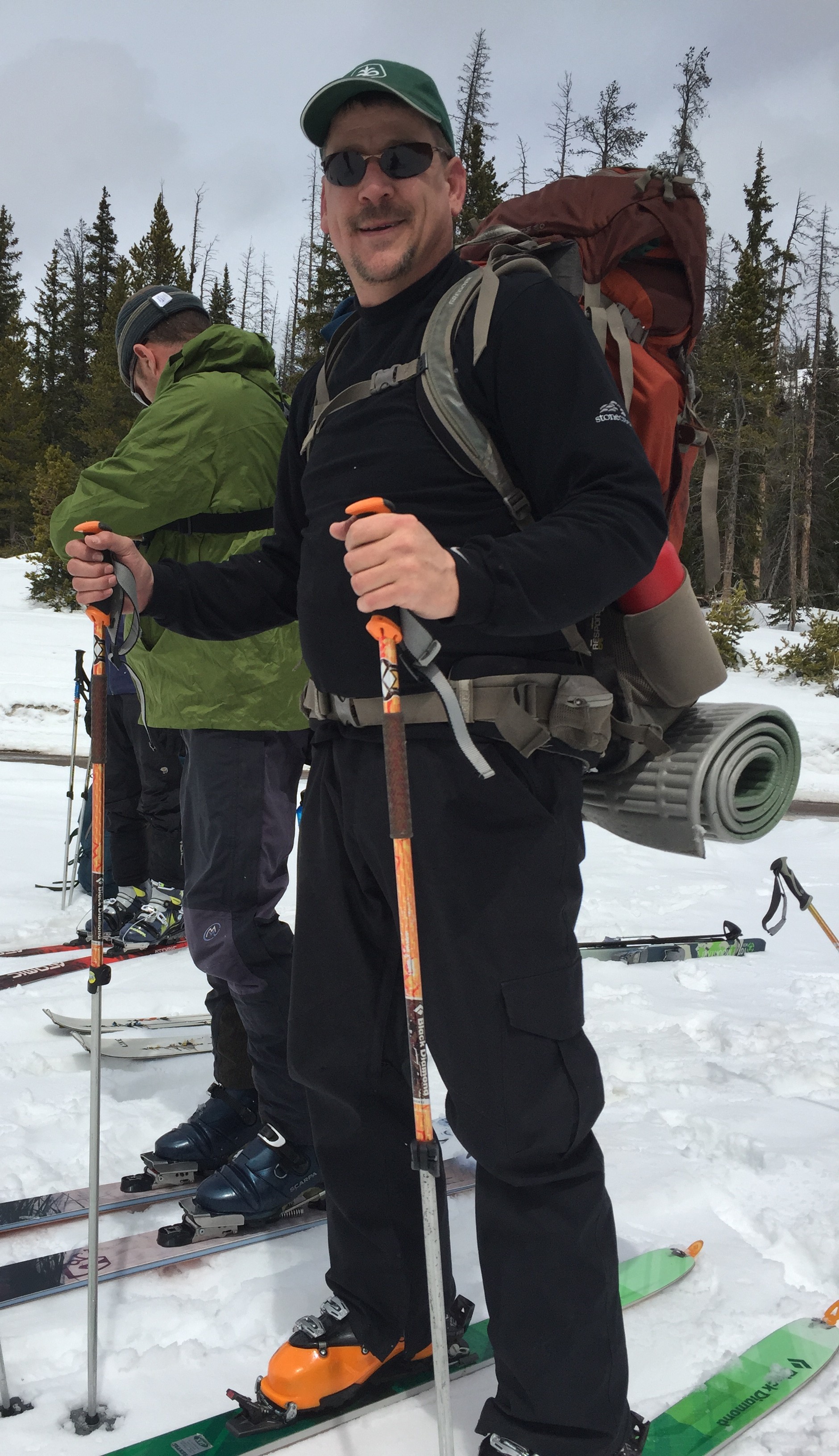 Bill snowboarding in the mountains